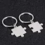Kľúčenka pre páry z chirurgickej ocele - Puzzle