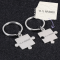 Kľúčenka pre páry z chirurgickej ocele - Puzzle